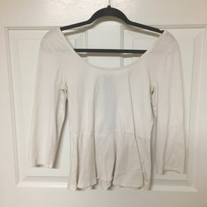 Elbow-length peplum top with back zipper